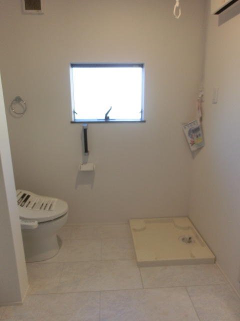 リビング以外の居室／外国式にトイレと洗濯機置き場