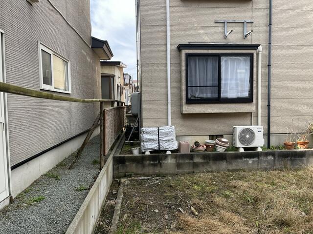 現地土地／南西側隣地境界