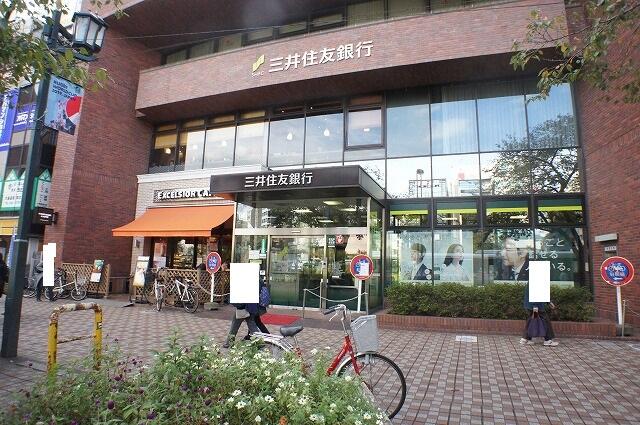 三井住友銀行国立支店 (126m)