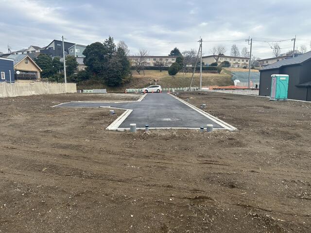 現地土地／区画６及び７の宅盤今日階部分より開発分譲地全体を撮影